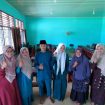 Kholid Khoirul Azam dan Fatma Yeni beserta Guru UPT SMPN 1 Kampar Kiri Hilir usai perlombaan jenjang nasional olimpiade Literasi Kebangsaan 2026