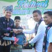 Bupati Kampar Ahmad Yuzar bersama Ketua Fraksi Nasdem DPRD Kampar Eko Sutrisno serta Lurah Lipat Kain Andi Sukma pada acara Festival Lipat Kain 2026